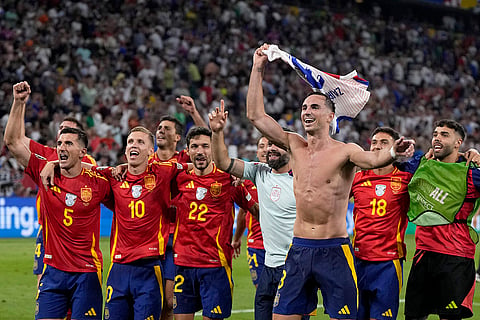 Spain's players celebrate their win against France